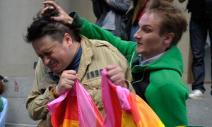 Russian Orthodox church activist attacks a gay rights proteste